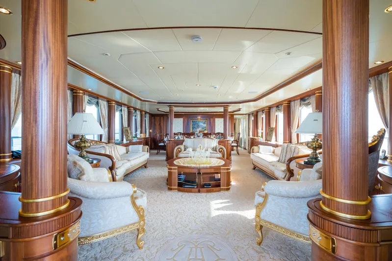 Aquamarina Yacht Photos Pics Luxurious interior of 2007 ISA Isa 470 yacht with elegant furnishings and wood accents.