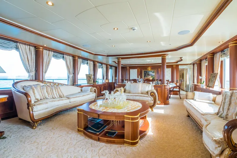 Aquamarina Yacht Photos Pics Luxurious interior of 2007 ISA Isa 470 yacht with elegant furnishings and panoramic windows.