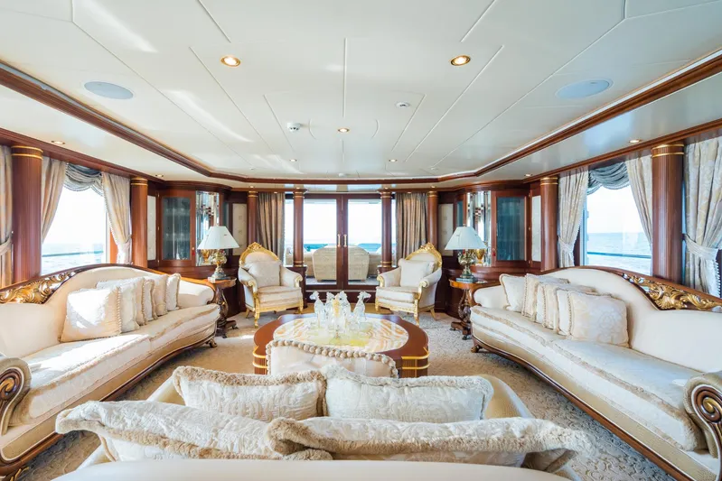 Aquamarina Yacht Photos Pics Luxurious interior of 2007 ISA Isa 470 yacht with elegant sofas and ornate decor.