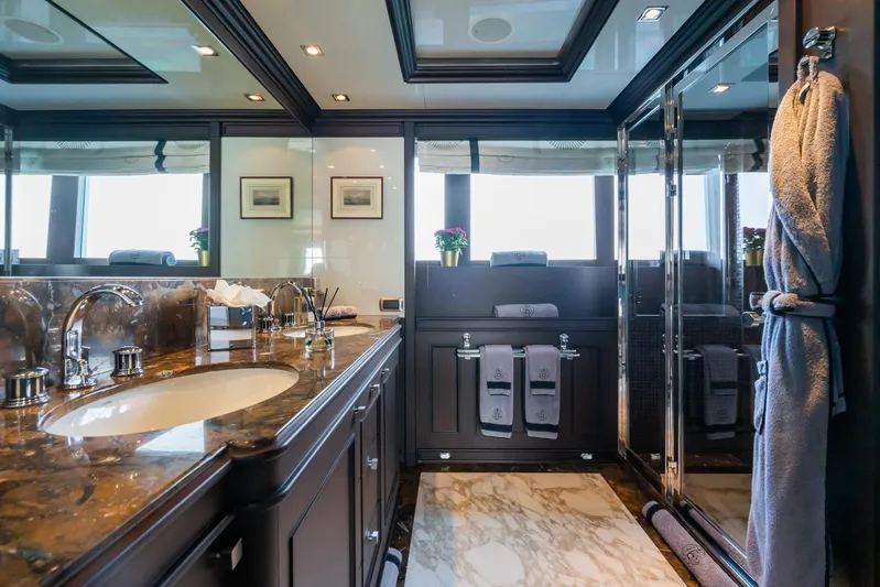 Aquamarina Yacht Photos Pics Luxurious yacht bathroom with marble countertop, elegant fixtures, and plush towels, ISA 470, 2007 model.