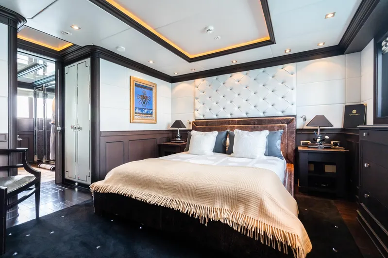 Aquamarina Yacht Photos Pics Luxurious bedroom interior on 2007 ISA Isa 470 yacht, featuring elegant decor and plush bedding.