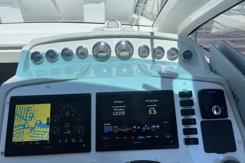 Romaniac Yacht Photos Pics Dashboard of 2021 Evolve 400HT yacht with navigation and control panels.