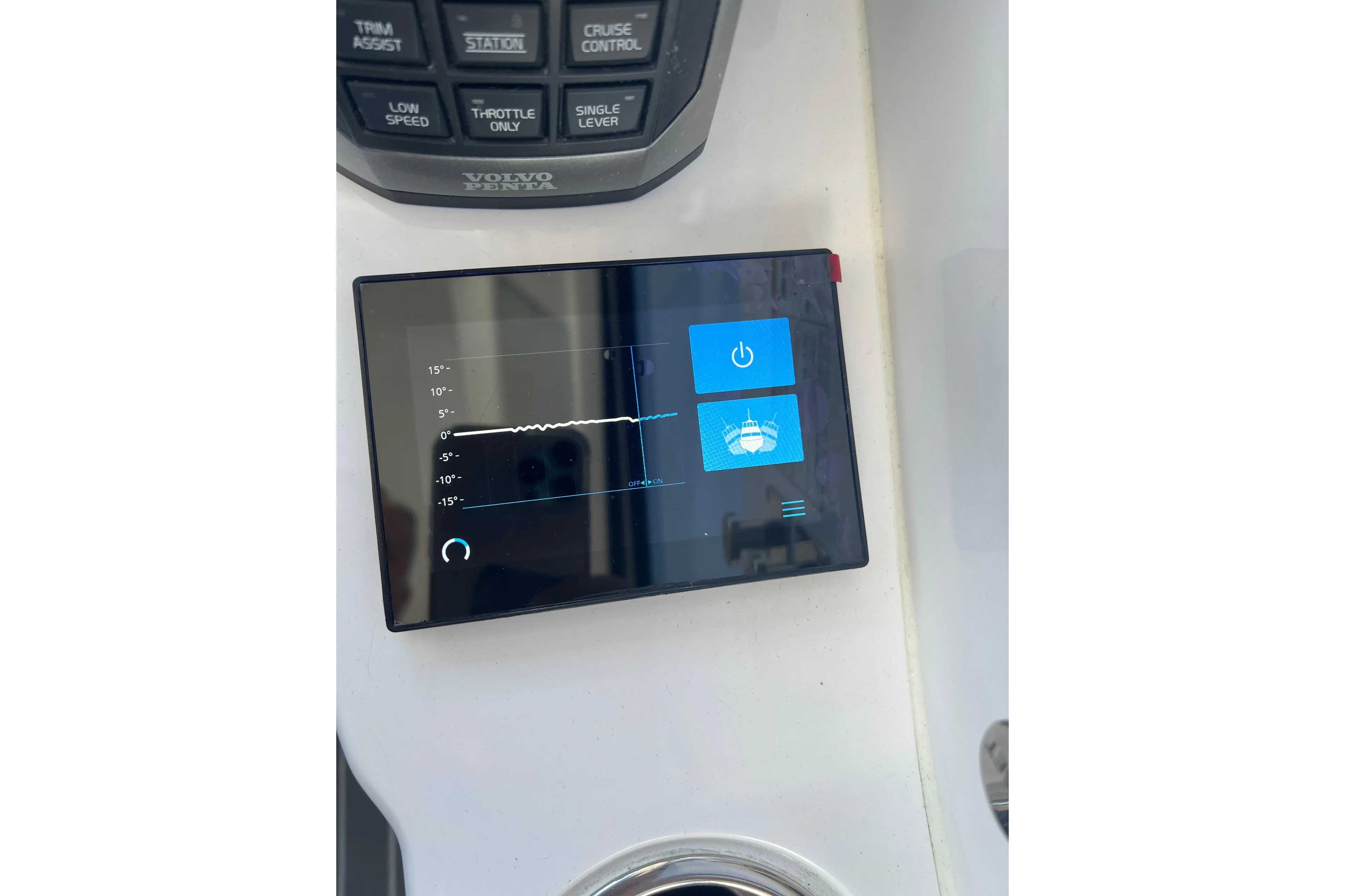 Control panel of a 2021 Evolve 400HT boat with digital display and buttons.