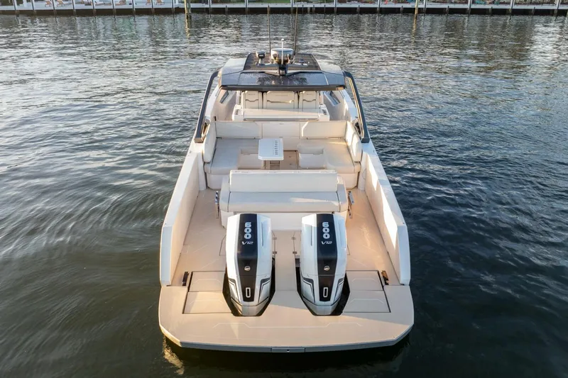  Yacht Photos Pics Luxury Limitless Seas XLV 45 boat with dual 600 V12 engines on calm water.