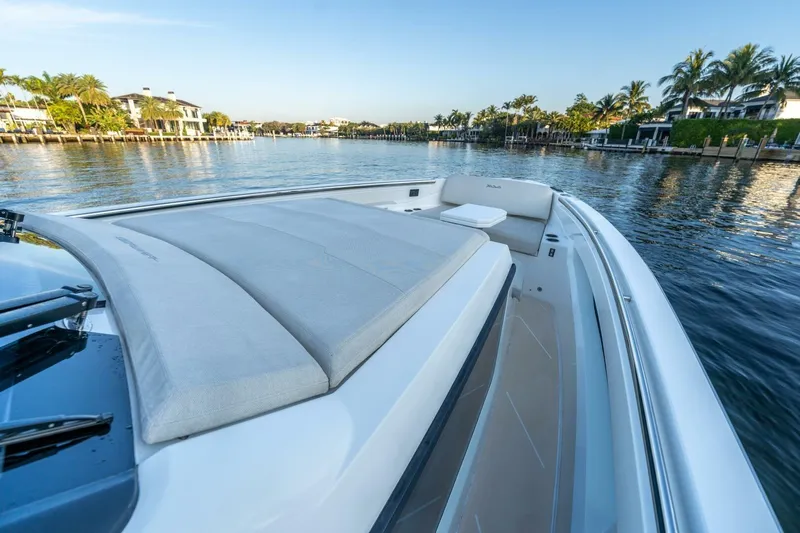  Yacht Photos Pics Luxury Limitless Seas XLV 45 boat on serene waterway, 2023 model.