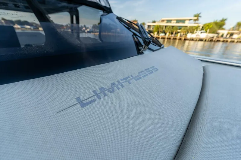  Yacht Photos Pics 2023 Limitless Seas XLV 45 boat with sleek design and waterfront view.