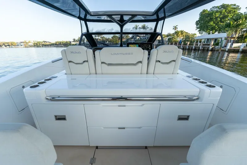  Yacht Photos Pics Luxury Limitless Seas XLV 45 yacht interior, featuring sleek seating and modern design, 2023 model.