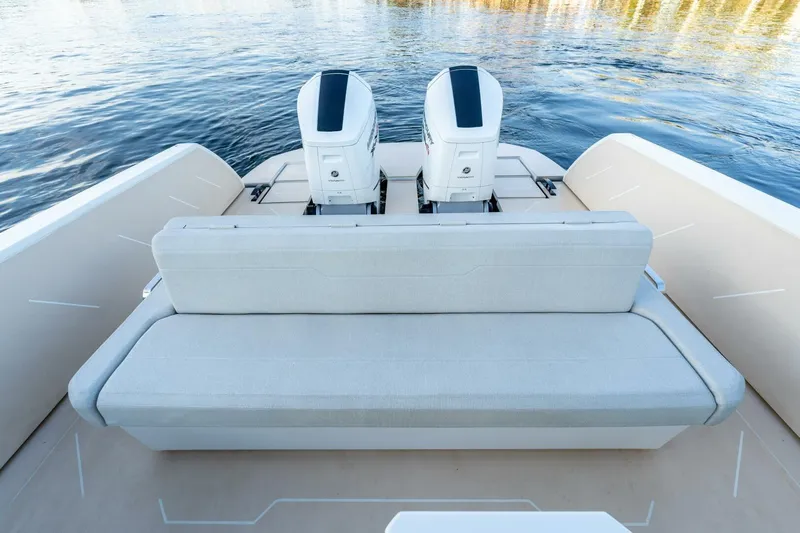  Yacht Photos Pics 2023 Limitless Seas XLV 45 boat with dual engines and cushioned seating on water.