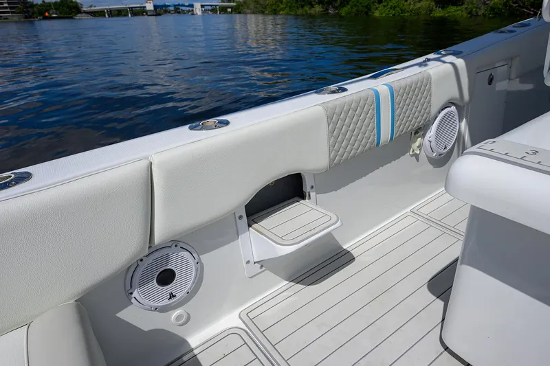  Yacht Photos Pics 2023 Powerplay Powerboats 30 RumRunner interior with sleek seating and modern design.