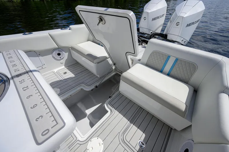  Yacht Photos Pics 2023 Powerplay Powerboats 30 RumRunner interior with seating and Mercury engines.