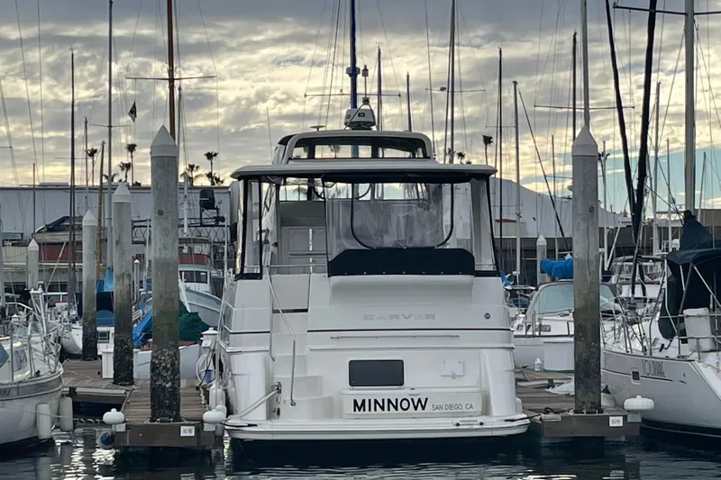 Minnow Yacht Photos Pics 2006 Carver 39 Motor Yacht docked in marina, overcast sky, San Diego, CA.