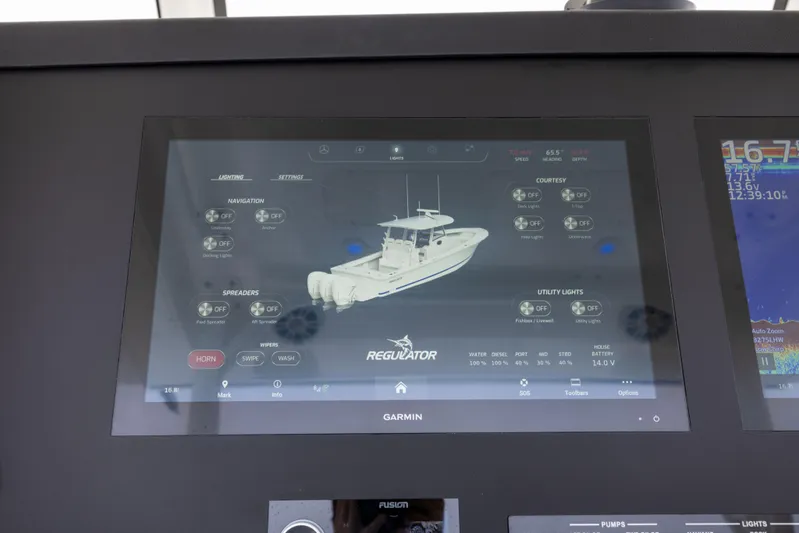 Comin In Reel Hot Yacht Photos Pics Garmin display on 2023 Regulator 37 boat showing system controls and diagnostics.