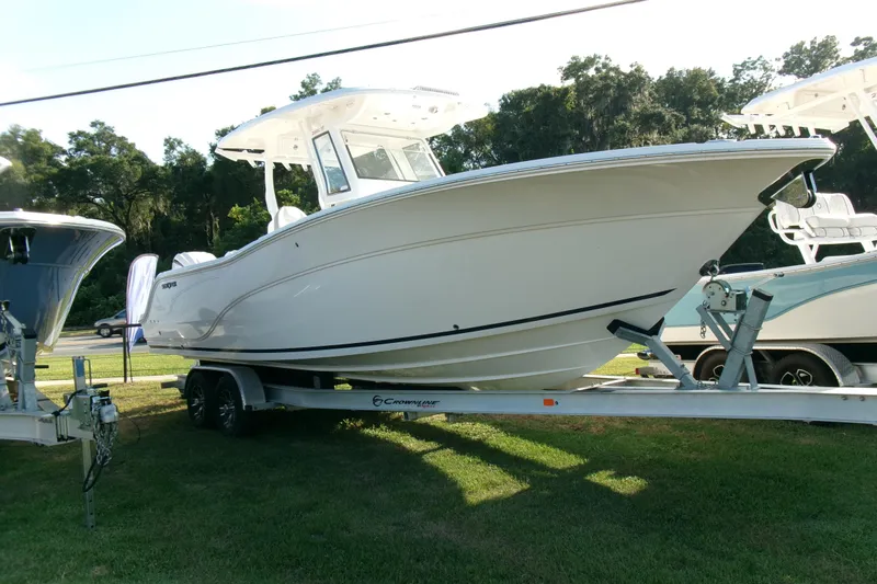 Look At This Boat! Wow! Yacht Photos Pics 2026 Sea Fox 288 Commander boat on trailer, parked on grass.