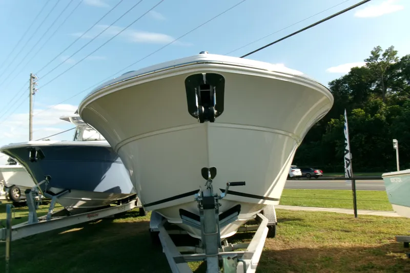 Look At This Boat! Wow! Yacht Photos Pics 2026 Sea Fox 288 Commander boat on trailer, displayed outdoors.
