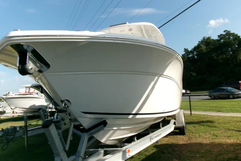 Look At This Boat! Wow! Yacht Photos Pics 2026 Sea Fox 288 Commander boat on trailer, parked outdoors under clear sky.
