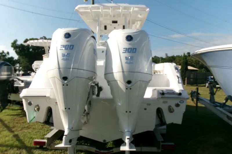 Look At This Boat! Wow! Yacht Photos Pics 2026 Sea Fox 288 Commander with twin 300 V6 engines, displayed outdoors.