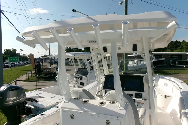 Look At This Boat! Wow! Yacht Photos Pics 2026 Sea Fox 288 Commander boat interior with helm, electronics, and rod holders.