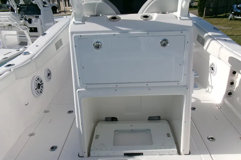 Look At This Boat! Wow! Yacht Photos Pics 2026 Sea Fox 288 Commander boat interior with storage compartment and seating area.