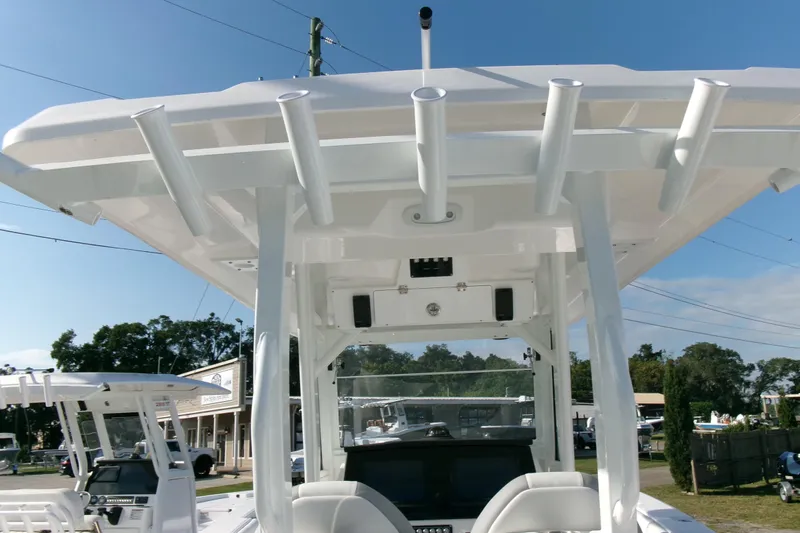 Look At This Boat! Wow! Yacht Photos Pics 2026 Sea Fox 288 Commander boat with T-top and rod holders, docked outdoors.