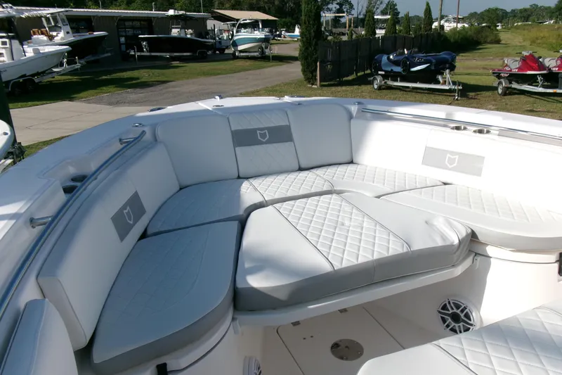 Look At This Boat! Wow! Yacht Photos Pics 2026 Sea Fox 288 Commander boat with luxurious white seating and quilted upholstery.