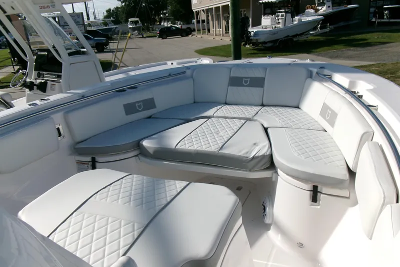 Look At This Boat! Wow! Yacht Photos Pics Luxurious seating on 2026 Sea Fox 288 Commander boat, featuring elegant quilted upholstery.