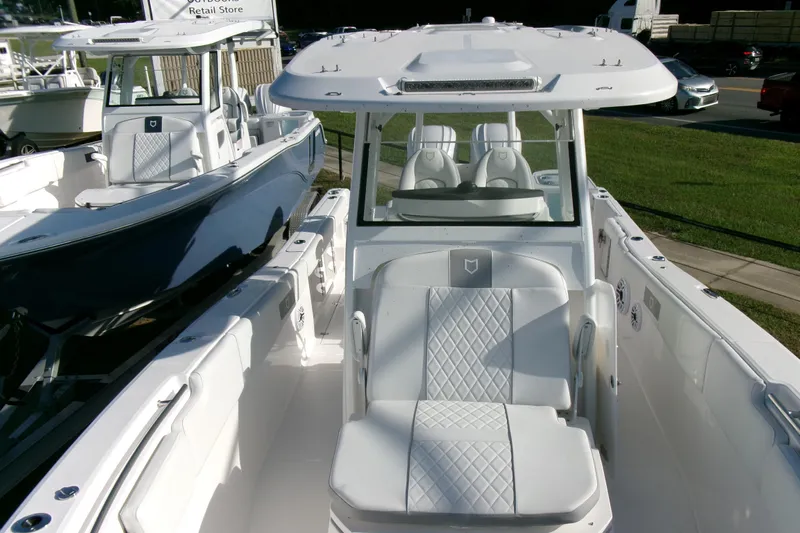 Look At This Boat! Wow! Yacht Photos Pics 2026 Sea Fox 288 Commander boat with sleek design and comfortable seating.