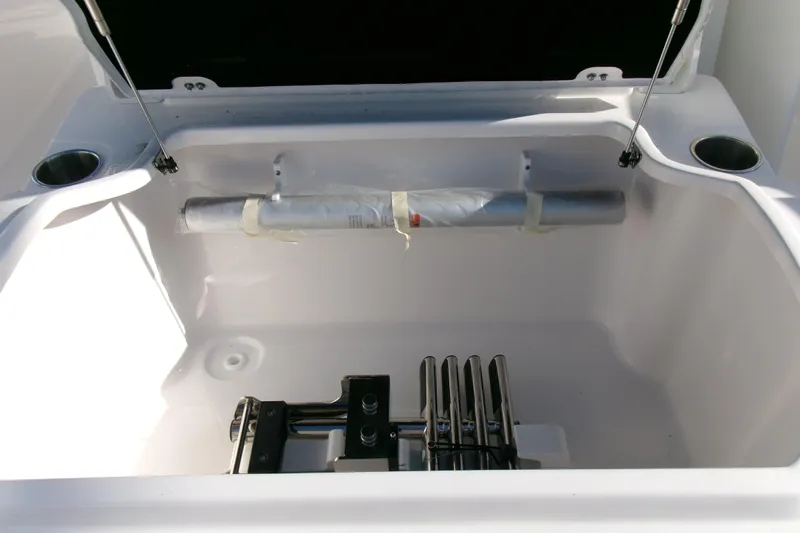 Look At This Boat! Wow! Yacht Photos Pics Storage compartment of 2026 Sea Fox 288 Commander boat, featuring rod holders and cup holders.