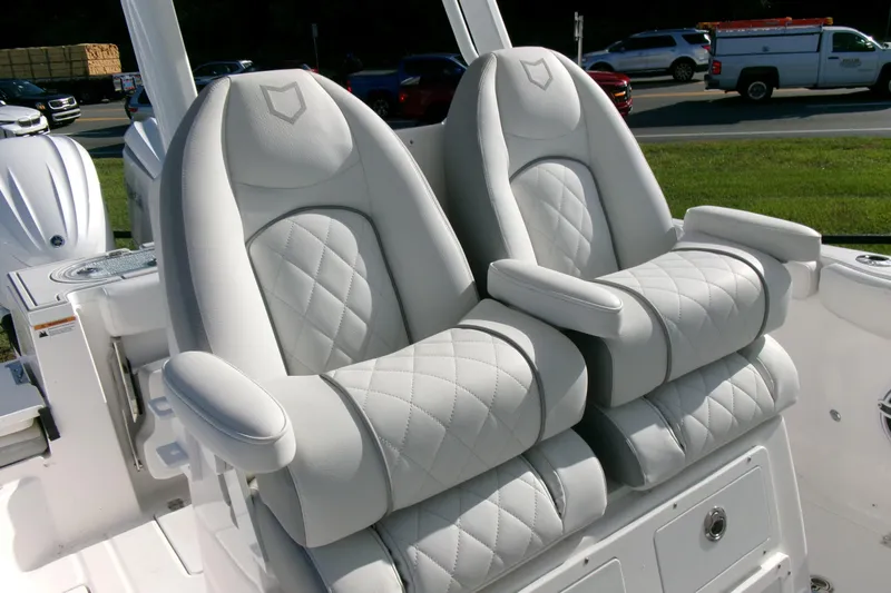 Look At This Boat! Wow! Yacht Photos Pics Luxurious seating on 2026 Sea Fox 288 Commander boat, featuring plush, quilted design.