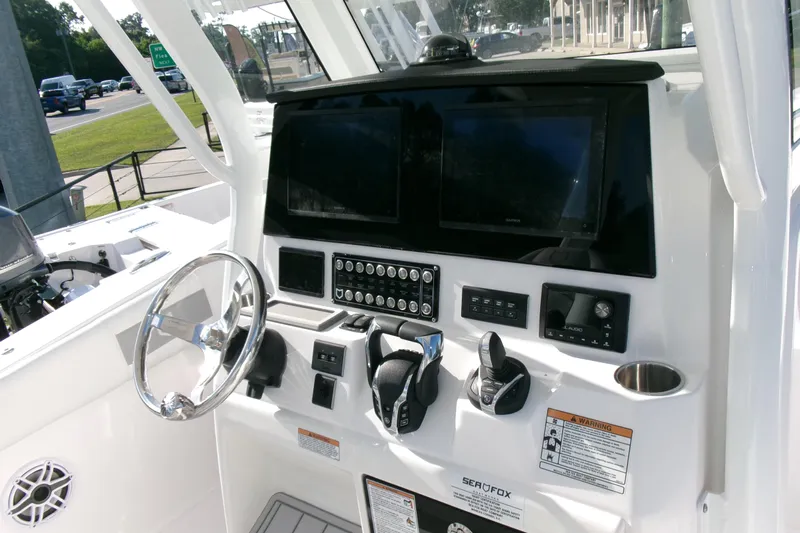 Look At This Boat! Wow! Yacht Photos Pics 2026 Sea Fox 288 Commander boat dashboard with modern controls and navigation screens.