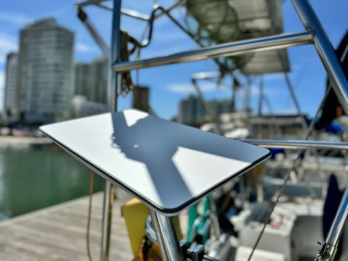  Yacht Photos Pics Beneteau Oceanis 473 sailboat detail with cityscape background, 2006 model.