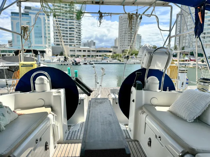  Yacht Photos Pics Beneteau Oceanis 473 yacht interior with cityscape view, 2006 model.