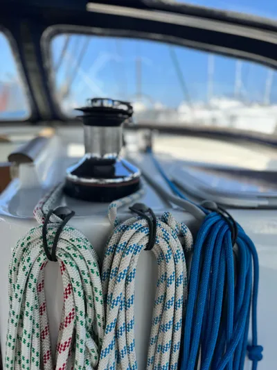  Yacht Photos Pics Sailing ropes on a 2006 Beneteau Oceanis 473 yacht, with winch in background.