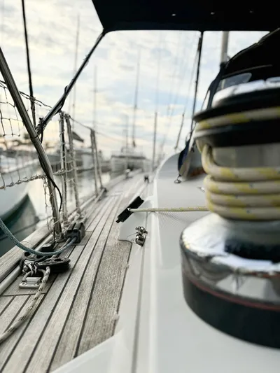  Yacht Photos Pics Close-up of 2006 Beneteau Oceanis 473 sailboat deck with winch and rigging.