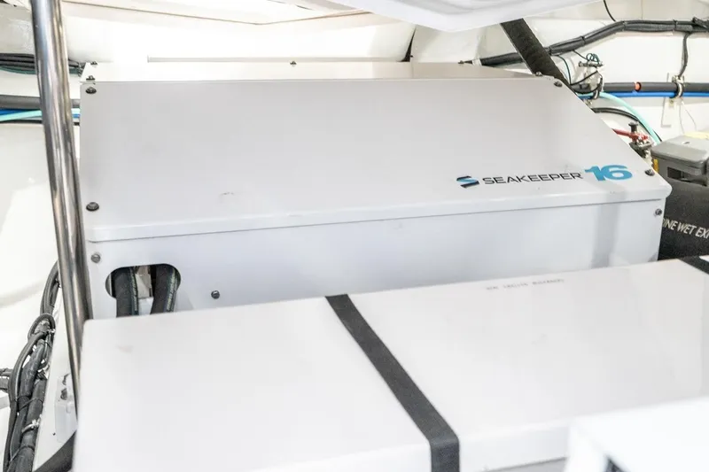 Valencia Yacht Photos Pics Engine room of 2019 Belize 66 Sedan featuring Seakeeper 16 stabilizer system.