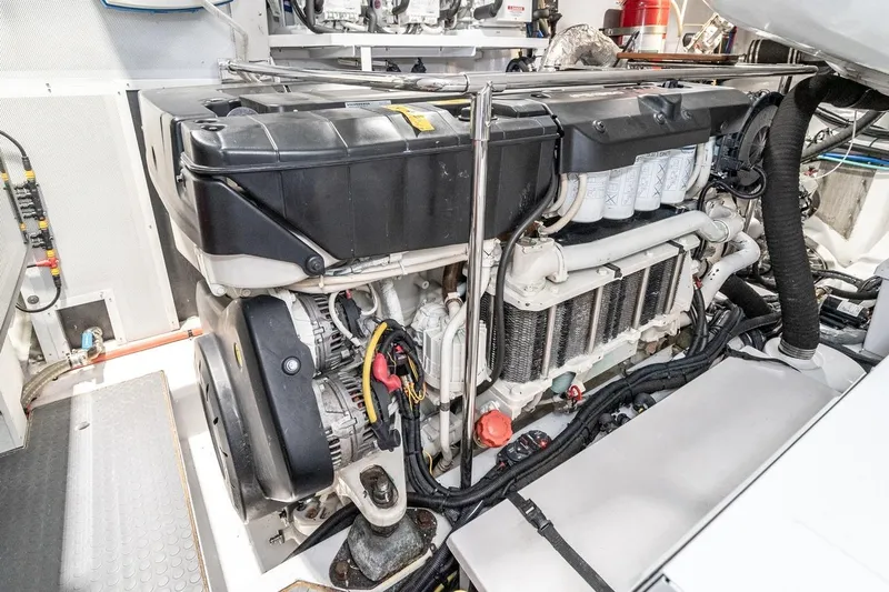 Valencia Yacht Photos Pics Engine room of a 2019 Belize 66 Sedan, showcasing detailed mechanical components.