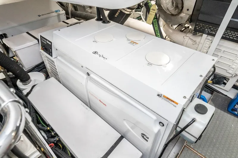 Valencia Yacht Photos Pics Engine room of 2019 Belize 66 Sedan with Cummins Onan generator.