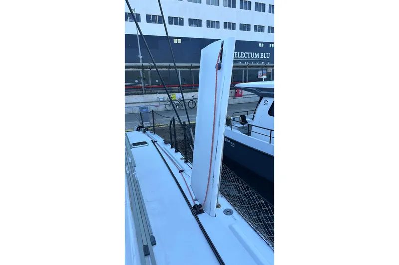 Gtfo Yacht Photos Pics Sailboat deck with raised daggerboard, Balance 482, 2023 model, docked at marina.