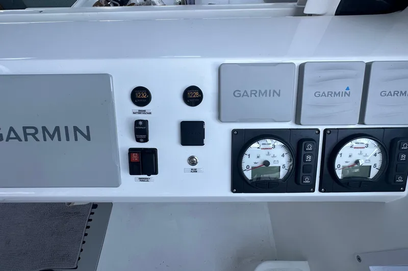 Gtfo Yacht Photos Pics Control panel of a 2023 Balance 482 boat featuring Garmin displays and gauges.