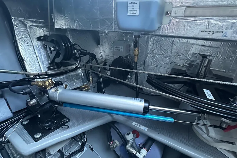 Gtfo Yacht Photos Pics Engine room of 2023 Balance 482 yacht, showcasing mechanical components and emergency steering tiller.