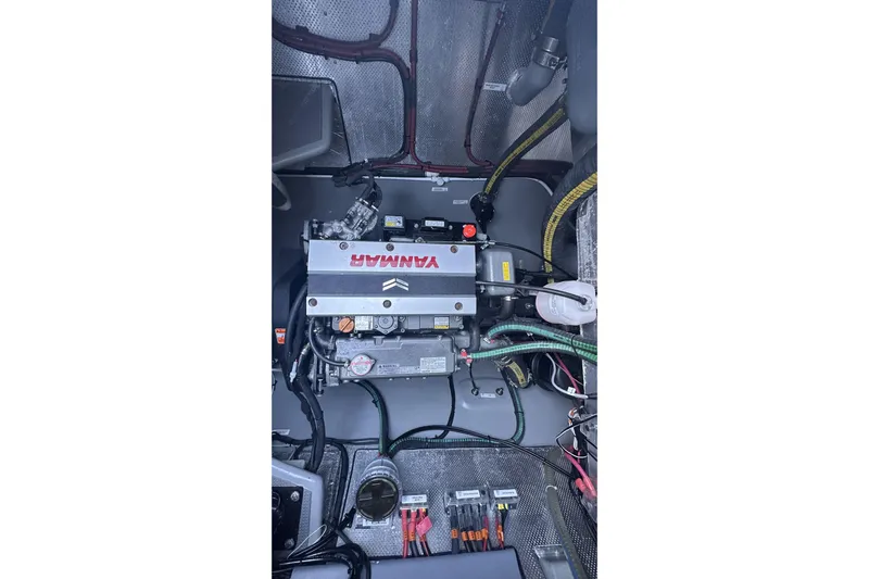 Gtfo Yacht Photos Pics Engine compartment of a 2023 Balance 482, featuring a Yanmar engine with visible wiring.