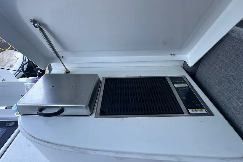 Gtfo Yacht Photos Pics Outdoor grill setup on a Balance 482 boat, 2023 model, featuring a Kenyon grill.