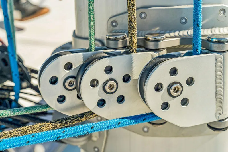 Gtfo Yacht Photos Pics Close-up of Balance 482 sailboat rigging system, featuring pulleys and colorful ropes, 2024 model.