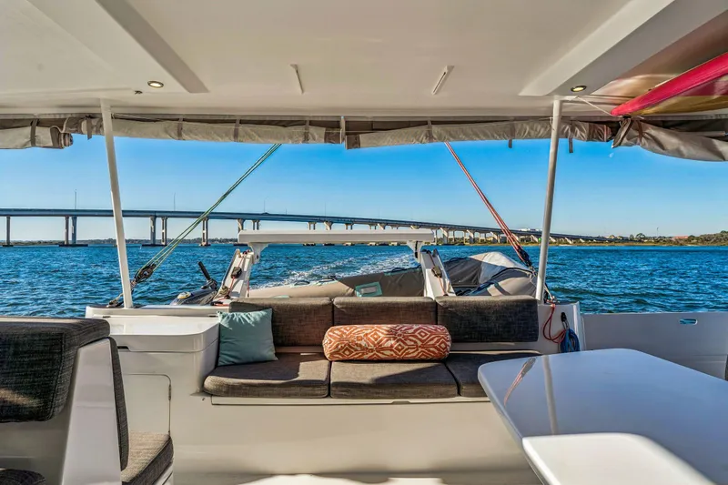 Gtfo Yacht Photos Pics Luxurious 2024 Balance 482 yacht interior with scenic ocean view and bridge in background.