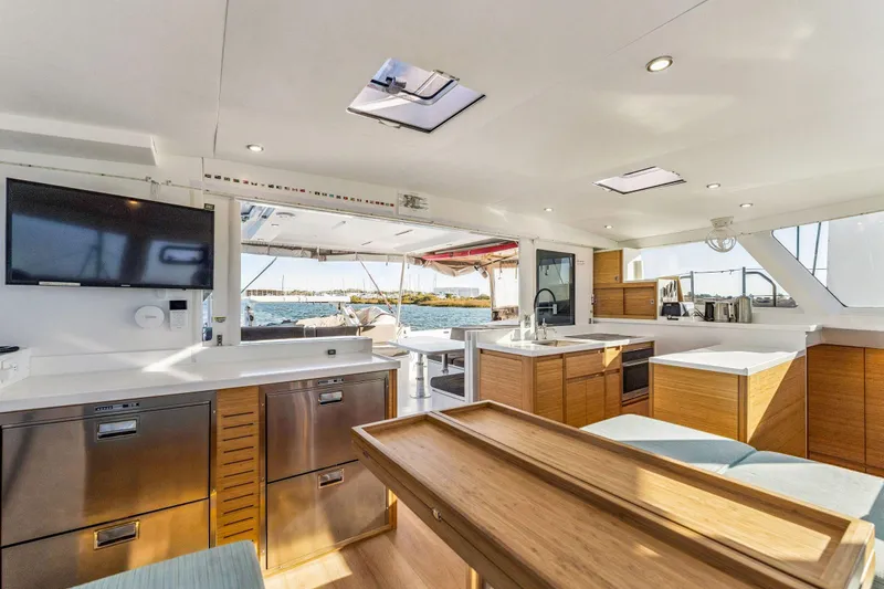 Gtfo Yacht Photos Pics Luxurious interior of 2024 Balance 482 yacht with modern kitchen and ocean view.