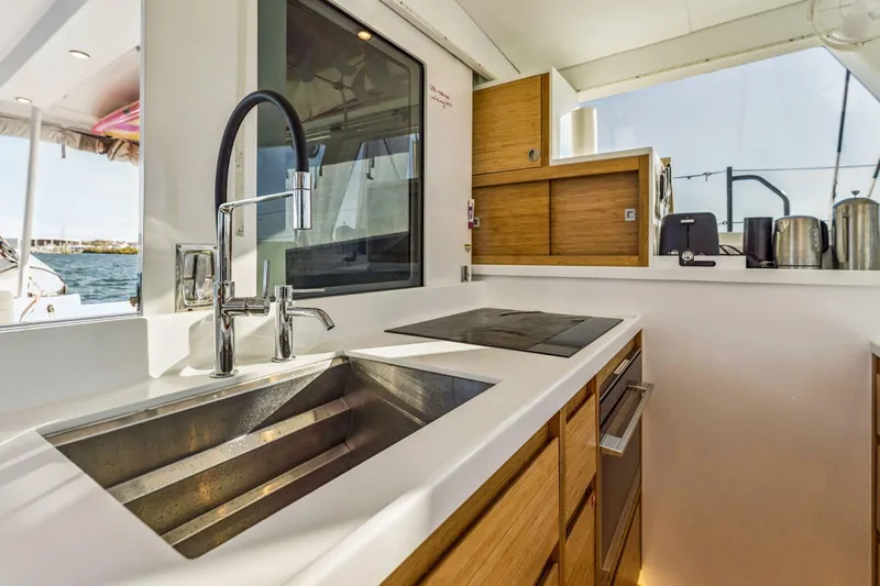 Gtfo Yacht Photos Pics Modern kitchen on 2024 Balance 482 yacht with sleek sink and appliances.