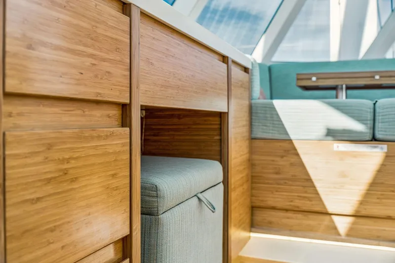 Gtfo Yacht Photos Pics Modern interior of Balance 482 yacht, featuring sleek wood cabinetry and comfortable seating, 2024 model.