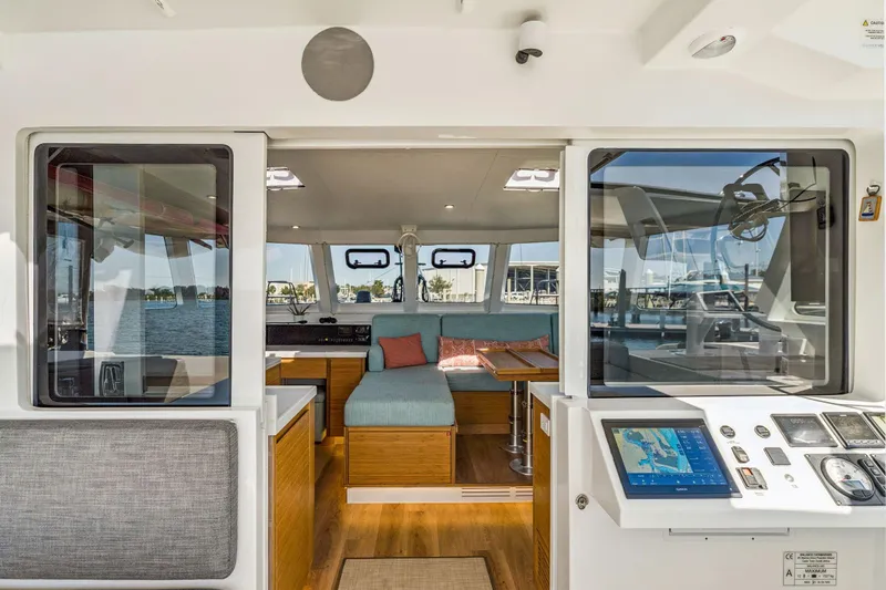 Gtfo Yacht Photos Pics Luxurious interior of 2024 Balance 482 yacht with modern navigation system and comfortable seating.