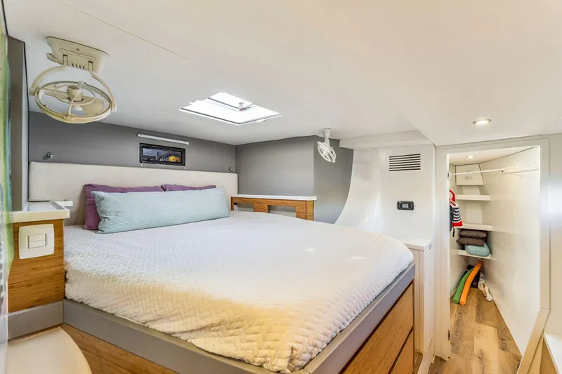 Gtfo Yacht Photos Pics Luxurious bedroom in 2024 Balance 482 yacht with modern design and cozy bedding.