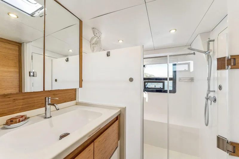 Gtfo Yacht Photos Pics Modern bathroom interior on 2024 Balance 482 yacht, featuring sleek design and wooden accents.