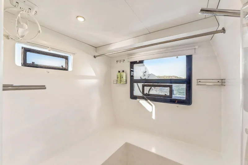 Gtfo Yacht Photos Pics Modern bathroom interior on 2024 Balance 482 yacht with ocean view windows.